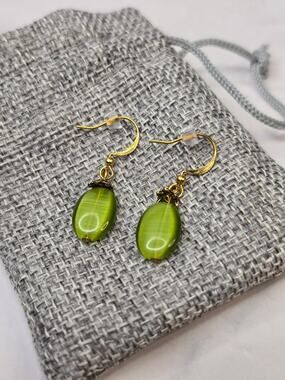 Gold Tone and Green Dangle Earrings